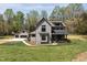 Spacious home with attached garage, manicured lawn and professional landscaping at 3601 Bivins Rd, Hillsborough, NC 27278