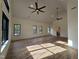 Open-concept room with many windows, natural light, and hardwood floors at 3601 Bivins Rd, Hillsborough, NC 27278