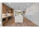 Modern kitchen features a large island, stainless steel appliances, and ample cabinet space at 3601 Bivins Rd, Hillsborough, NC 27278