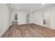 Spacious living room with hardwood floors, white trim, and ample natural light at 3601 Bivins Rd, Hillsborough, NC 27278