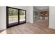 Living Space featuring hardwood floors, sliding glass doors to deck, bar area at 3601 Bivins Rd, Hillsborough, NC 27278