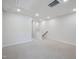 Spacious carpeted basement area with recessed lighting and a stairway leading to the upper floor at 3717 Rosebush Dr, Zebulon, NC 27597