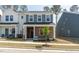 Charming two-story home featuring a brick facade, gray shingles, and a well-manicured lawn at 3719 Rosebush Dr, Zebulon, NC 27597
