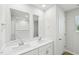 Stylish bathroom features a double sink vanity with modern fixtures and large mirrors at 3825 Rosebush Dr, Zebulon, NC 27597