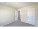 Light-filled bedroom with a walk-in closet and soft carpeting is ready for personalization at 3825 Rosebush Dr, Zebulon, NC 27597