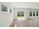 Sun-drenched living area featuring sliding glass doors to the backyard and ample natural light at 3825 Rosebush Dr, Zebulon, NC 27597
