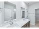 Bathroom featuring a double vanity sink with modern fixtures, and neutral color palette at 3829 Rosebush Dr, Zebulon, NC 27597