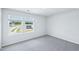 Bright bedroom with views, neutral paint, carpet, and ample natural light at 3829 Rosebush Dr, Zebulon, NC 27597