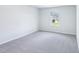 Bedroom featuring soft carpet and a bright window that offers natural light at 3829 Rosebush Dr, Zebulon, NC 27597