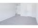 Bedroom features soft carpet and multiple doors leading to other rooms at 3829 Rosebush Dr, Zebulon, NC 27597