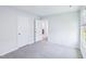 Neutral bedroom showcasing plush carpet, a closet, and plenty of natural light at 3829 Rosebush Dr, Zebulon, NC 27597