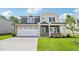 Charming home with a two-car garage, brick accents, and a well-manicured lawn, perfect for curb appeal at 3829 Rosebush Dr, Zebulon, NC 27597