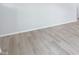 Close-up of pristine light wood floors, showcasing the clean and modern aesthetic of the home's interior at 3829 Rosebush Dr, Zebulon, NC 27597