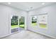 Bright Living room with sliding glass door and lots of natural light at 3829 Rosebush Dr, Zebulon, NC 27597