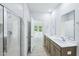 Bathroom with walk-in shower, dual sinks, and plenty of counter space at 3829 Rosebush Dr, Zebulon, NC 27597