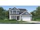 Charming two-story home with gray siding, a black roof, and a two-car garage at 4020 Shadbush St, Raleigh, NC 27616