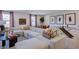 This living room has carpet, a comfortable sofa, and a ping pong table at 408 Carpels Dr, Wendell, NC 27591
