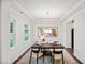 Bright office with tray ceiling, recessed lighting, decorative light fixture, two windows and contemporary furnishings at 4101 Shadbush St, Raleigh, NC 27616