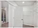 Well-organized walk-in closet with shelving and rod for ample storage, located off the bathroom at 4101 Shadbush St, Raleigh, NC 27616