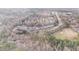An aerial view of a multi-unit housing complex with parking and green space at 411 Weather Ridge Ln # 45, Cary, NC 27513