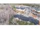 Aerial view of a new apartment building in a wooded area at 411 Weather Ridge Ln # 45, Cary, NC 27513