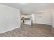 Bright living room with wood floors, and an open concept to the kitchen at 411 Weather Ridge Ln # 45, Cary, NC 27513