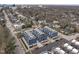 An aerial shot of a modern home community surrounded by lush greenery, highlighting its location and neighborhood at 5 Seawell Ave # 106, Raleigh, NC 27601