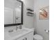 Modern bathroom featuring a sleek vanity, minimalist decor, and a well-lit mirror at 5 Seawell Ave # 106, Raleigh, NC 27601