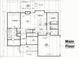 Architectural drawing showing main floor layout including kitchen, living spaces, and garage at 5 Sweet Sister Way, Youngsville, NC 27596