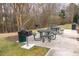 Community grilling area features picnic tables and charcoal grills for outdoor gatherings at 515 Littleport Dr, Rolesville, NC 27571