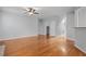 Hardwood floors enhance this living space that offers abundant natural light and an open floor plan at 515 Littleport Dr, Rolesville, NC 27571