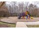 Community playground featuring a swing set and slide for outdoor fun at 515 Littleport Dr, Rolesville, NC 27571