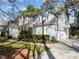 Well-maintained home featuring manicured landscaping, a driveway, and an attached garage at 5413 Leopards Bane Ct, Holly Springs, NC 27540