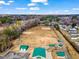 An aerial view showcases neighborhood baseball fields and nearby residential area at 561 Circle Dr, Angier, NC 27501