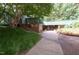 Unique building exterior with lush landscaping and a welcoming entrance at 5815 Windham Dr, Raleigh, NC 27609