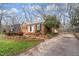 Well-maintained brick home with manicured landscaping and an inviting curb appeal at 5815 Windham Dr, Raleigh, NC 27609