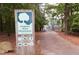 Capital Area Greenway entrance sign and paved path through a wooded area at 5815 Windham Dr, Raleigh, NC 27609
