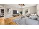 Bright living room featuring hardwood floors, large windows, and stylish decor at 5815 Windham Dr, Raleigh, NC 27609