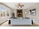Cozy living room with brick fireplace, french doors, and neutral décor at 5815 Windham Dr, Raleigh, NC 27609