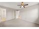 Spacious bedroom with a ceiling fan, closet, and neutral color palette at 5815 Windham Dr, Raleigh, NC 27609