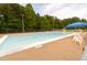 Large outdoor swimming pool with lounge chairs, perfect for recreation and relaxation at 5815 Windham Dr, Raleigh, NC 27609