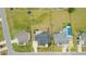 The home's location is beautifully captured in this aerial shot of the well-kept lawn and neighborhood at 5820 Brayton Park Pl, Holly Springs, NC 27540