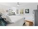Serene bedroom with plantation shutters, neutral decor, and ample natural light at 5920 North Hills Dr, Raleigh, NC 27609