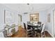 Cozy breakfast nook with modern lighting, hardwood floors, and stylish decor at 5920 North Hills Dr, Raleigh, NC 27609