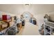 Spacious attic storage with carpet, sloped ceilings, and a small window at 63 Radcliffe Ct, Clayton, NC 27527