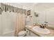 Functional bathroom with a shower-tub combination and ample counter space at 63 Radcliffe Ct, Clayton, NC 27527