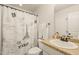 Well-maintained bathroom featuring a vanity, toilet, and shower with decorative shower curtain at 63 Radcliffe Ct, Clayton, NC 27527