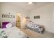 Charming bedroom with two twin beds, soft decor, and a shared nightstand at 63 Radcliffe Ct, Clayton, NC 27527