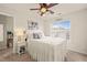 Comfortable bedroom filled with natural light showcasing a soft color palette at 63 Radcliffe Ct, Clayton, NC 27527