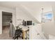 Bright office space with natural light, a desk setup, and additional storage at 63 Radcliffe Ct, Clayton, NC 27527